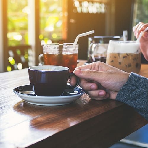 people enjoying coffee